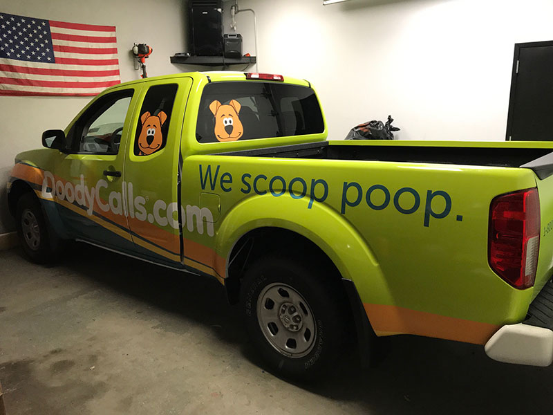 We Scoop Poop vehicle wrap in New York